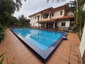 Spacious corner lot bungalow in Mutiara Damansara with private lap pool, 7 bedrooms, and landscaped garden in secure gated community