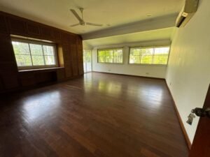 Elegant corner lot bungalow for rent in Bukit Tunku, Kuala Lumpur, featuring a spacious garden, modern interiors, and a bath tub for added comfort.