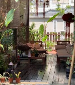 Front view of a luxurious 3-storey semi-detached house in Duta Tropika, featuring modern architectural design and a beautifully landscaped garden."