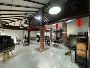 Spacious living area of a partially furnished 6+1 bedroom home in Bukit Tunku, featuring modern and classic design elements.
