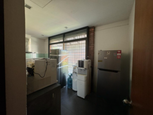 Spacious living area of a partially furnished 6+1 bedroom home in Bukit Tunku, featuring modern and classic design elements.