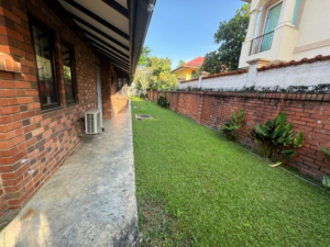 Spacious living area of a partially furnished 6+1 bedroom home in Bukit Tunku, featuring modern and classic design elements.