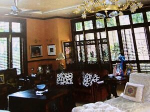 Interior view of a luxurious 4+2 bedroom bungalow in Bukit Tunku, highlighting the private swimming pool and elegant design.