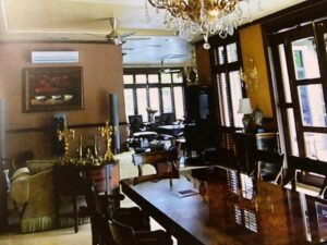Interior view of a luxurious 4+2 bedroom bungalow in Bukit Tunku, highlighting the private swimming pool and elegant design.