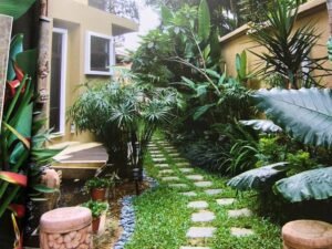Interior view of a luxurious 4+2 bedroom bungalow in Bukit Tunku, highlighting the private swimming pool and elegant design.