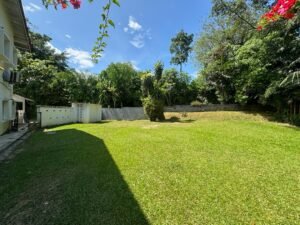 Comfortable bungalow for rent in Bukit Tunku, Kuala Lumpur. 5 bedrooms, 7 bathrooms, 1 maid room, garden, balcony, swimming pool, and parking. Rental price RM 25,000/month. Spacious layout with modern finishes and greenery views.