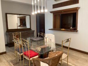 Spacious 4-bedroom house for rent in Bukit Tunku, Kuala Lumpur, featuring a balcony, garden, and premium facilities like a swimming pool, gym, and 24-hour security.