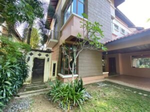 Front view of a luxurious 4-bedroom bungalow in Duta Nusantara, Sri Hartamas, featuring modern architectural design and a beautifully landscaped garden