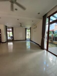 Front view of a luxurious 4-bedroom bungalow in Duta Nusantara, Sri Hartamas, featuring modern architectural design and a beautifully landscaped garden