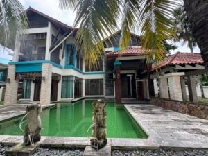 Luxurious Balinese-inspired bungalow in Ampang Hilir featuring tropical architecture, private swimming pool, and lush landscaping in Embassy Row