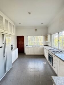 Elegant bungalow for rent in Bukit Tunku, Kuala Lumpur, featuring a private swimming pool, modern interiors, and lush green surroundings.