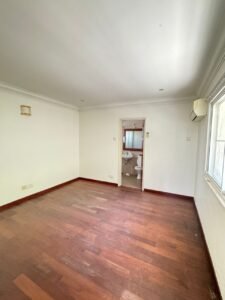 Elegant bungalow for rent in Bukit Tunku, Kuala Lumpur, featuring a private swimming pool, modern interiors, and lush green surroundings.