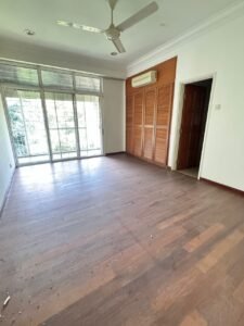 Elegant bungalow for rent in Bukit Tunku, Kuala Lumpur, featuring a private swimming pool, modern interiors, and lush green surroundings.