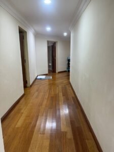 Front view of a luxurious bungalow in Bukit Damansara, featuring a mature landscaped garden and elegant architectural design.