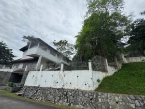 Premium development land in Taman Persiaran Tunku featuring 45,617 sq.ft. across two adjacent lots with private road access in exclusive Kuala Lumpur neighborhood