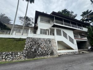Premium development land in Taman Persiaran Tunku featuring 45,617 sq.ft. across two adjacent lots with private road access in exclusive Kuala Lumpur neighborhood