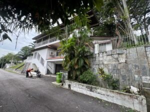 Premium development land in Taman Persiaran Tunku featuring 45,617 sq.ft. across two adjacent lots with private road access in exclusive Kuala Lumpur neighborhood