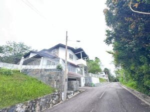 Premium development land in Taman Persiaran Tunku featuring 45,617 sq.ft. across two adjacent lots with private road access in exclusive Kuala Lumpur neighborhood
