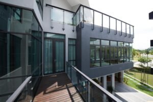 Front view of a luxurious 6-bedroom bungalow in Damansara Heights, featuring a private swimming pool and modern architectural design.