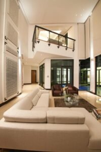 Front view of a luxurious 6-bedroom bungalow in Damansara Heights, featuring a private swimming pool and modern architectural design.