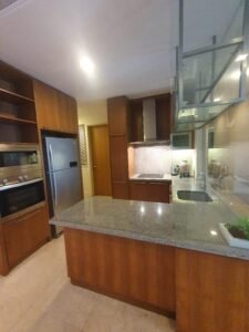 Luxury serviced residence for sale at Binjai Residency, KLCC. 2,098 sq.ft., 3+1 bedrooms, 4 bathrooms, 2 car parks. Fully furnished with modern essentials. Facilities include swimming pool, sauna, gym, tennis courts, clubhouse, and 24-hour security. RM 2.1 million.
