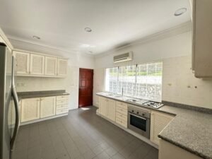 Elegant corner lot bungalow for rent in Bukit Tunku, Kuala Lumpur, featuring a spacious garden, modern interiors, and a bath tub for added comfort.