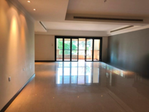 Designer renovated condominium in Bukit Tunku featuring spacious living areas, marble kitchen countertops, and balcony views of greenery and pool in exclusive Kenny Hills neighborhood