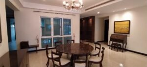 Luxurious duplex penthouse in Bukit Tunku featuring 7 bedrooms, modern facilities including swimming pool and gym, and panoramic views from private balcony in exclusive Kenny Hills neighborhood
