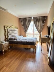 Luxurious duplex condominium in Sutera Bukit Tunku featuring spacious living areas, surrounded by lush greenery in exclusive low-density development just minutes from KLCC