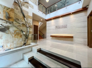 Luxurious bungalow in Tijani 2 South featuring spacious living areas, six bedrooms, and surrounded by lush greenery in exclusive low-density Bukit Tunku neighborhood