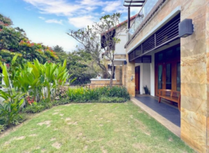 Luxurious bungalow in Tijani 2 South featuring spacious living areas, six bedrooms, and surrounded by lush greenery in exclusive low-density Bukit Tunku neighborhood