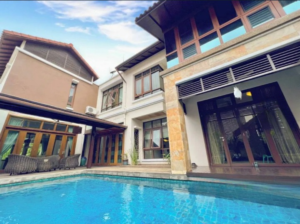 Luxurious bungalow in Tijani 2 South featuring spacious living areas, six bedrooms, and surrounded by lush greenery in exclusive low-density Bukit Tunku neighborhood