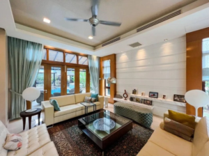 Luxurious bungalow in Tijani 2 South featuring spacious living areas, six bedrooms, and surrounded by lush greenery in exclusive low-density Bukit Tunku neighborhood