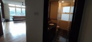 Luxurious duplex penthouse in Bukit Tunku featuring 7 bedrooms, modern facilities including swimming pool and gym, and panoramic views from private balcony in exclusive Kenny Hills neighborhood