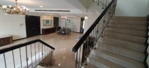 Luxurious duplex penthouse in Bukit Tunku featuring 7 bedrooms, modern facilities including swimming pool and gym, and panoramic views from private balcony in exclusive Kenny Hills neighborhood