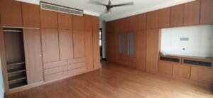 Luxurious duplex penthouse in Bukit Tunku featuring 7 bedrooms, modern facilities including swimming pool and gym, and panoramic views from private balcony in exclusive Kenny Hills neighborhood