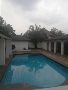 Sophisticated 5,610 sq.ft. bungalow in Ampang Hilir featuring swimming pool, spacious master bedroom with walk-in wardrobe, and built-in kitchen cabinetry on a generous 16,608 sq.ft. freehold estate