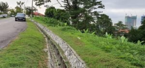 Strategic 25,700 sq.ft. vacant bungalow lot in exclusive Taman Duta featuring premium positioning facing Masjid Wilayah and backing onto MACC Building in one of Kuala Lumpur's most prestigious neighborhoods