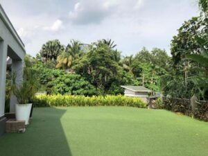 Prestigious 5-bedroom mansion in Kenny Hills (Bukit Tunku) featuring panoramic views, private swimming pool, and extensive gardens on a 30,480 sq.ft. freehold elevated lot in Kuala Lumpur's most exclusive neighborhood