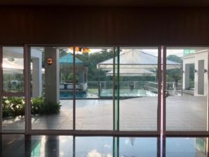 Prestigious 5-bedroom mansion in Kenny Hills (Bukit Tunku) featuring panoramic views, private swimming pool, and extensive gardens on a 30,480 sq.ft. freehold elevated lot in Kuala Lumpur's most exclusive neighborhood