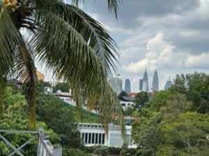 Spectacular 85,842 sq.ft. elevated development land in Bukit Tunku featuring unobstructed KLCC skyline views, flat building platform, and lush green surroundings in Malaysia's most exclusive residential enclave