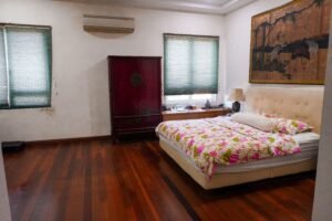 Spacious freehold bungalow in Bangsar, Kuala Lumpur featuring 12,000 sq.ft. built-up, 5+2 bedrooms, private garden, and prime location near BSC and Pantai Hospital.