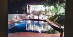 Expansive freehold bungalow in Bukit Tunku on 31,750 sq.ft. land featuring private swimming pool, lush garden, fully furnished luxury residence.